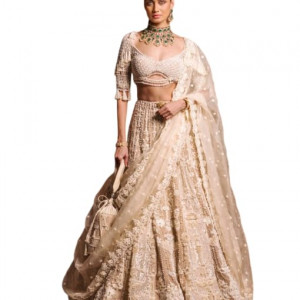 Woman's Beige-based Ivory Lehenga Set